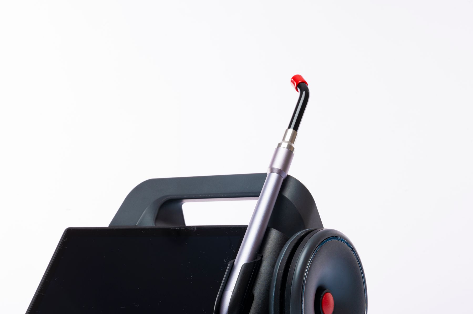 Modern dental laser device with a screen and handpiece in a clinic