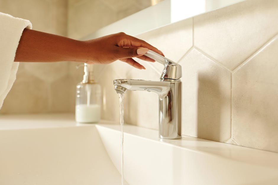 Water flowing from a bathroom sink tap